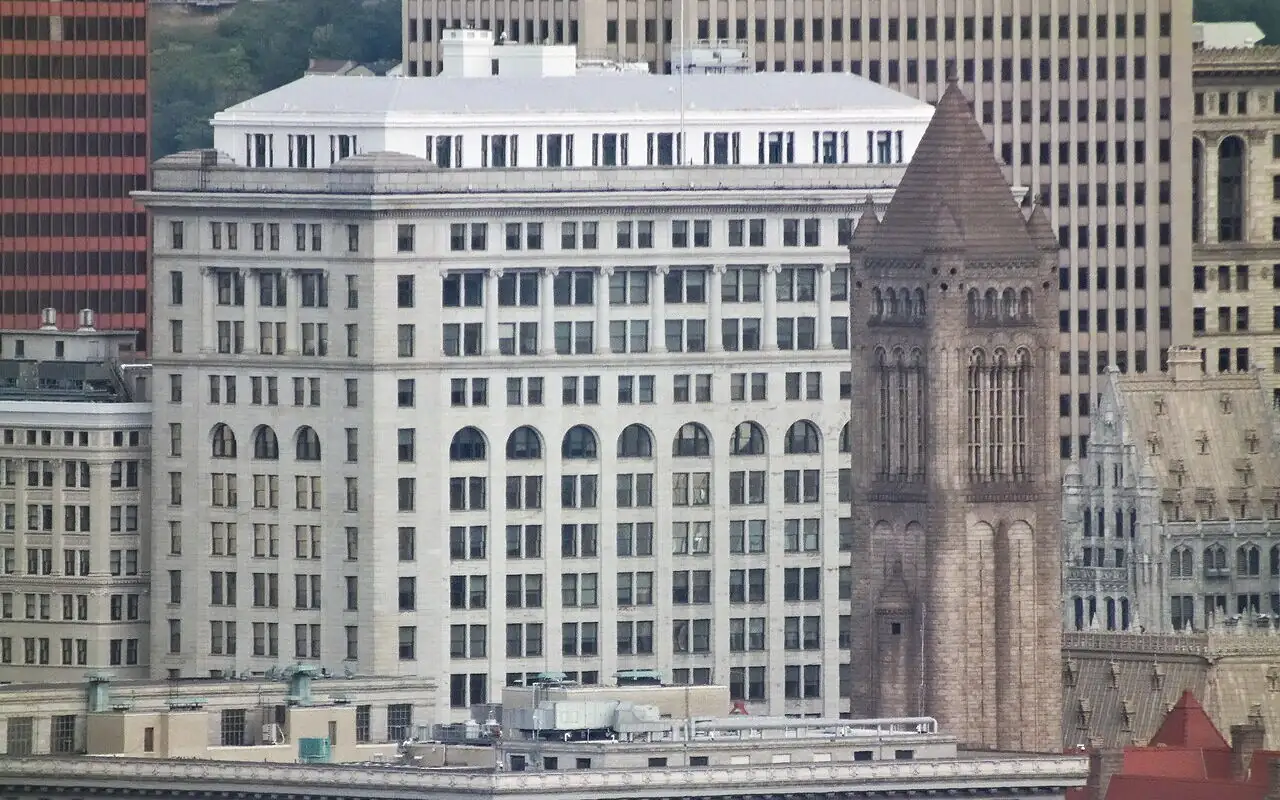 Allegheny County Courthouse tower and the Frick Building in downtown Pittsburgh, PA
